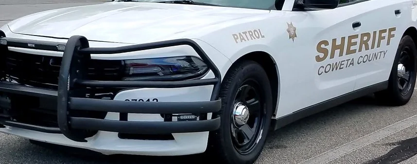 Coweta County Deputy Seriously Injured After Patrol Car Struck on I-85