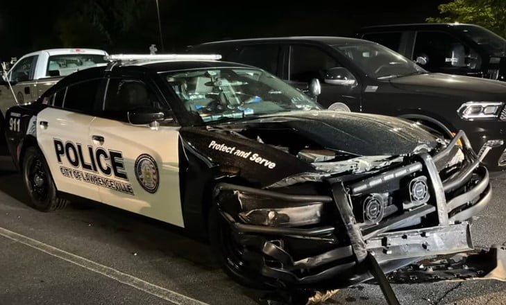 Vehicle Running Red Light Hits Lawrenceville Police Unit