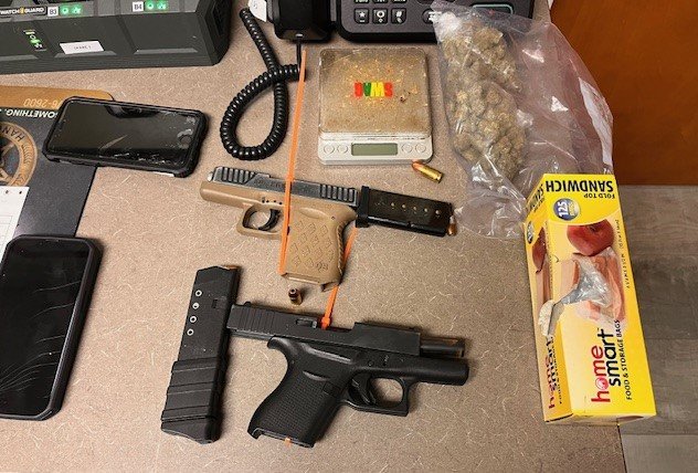 Two Arrested After Traffic Stop Leads to Discovery of Drugs and Firearms in Crisp County