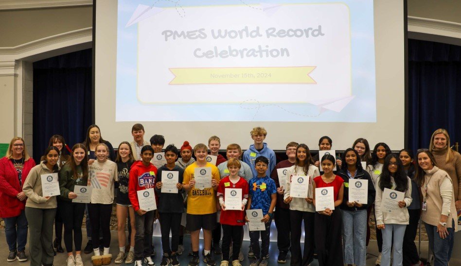 Elementary Students in Forsyth County Break Guinness World Record for Longest Paper Airplane Chain