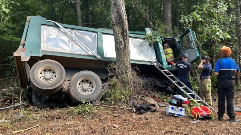 Driver Airlifted After Dump Truck Crashes into Tree Line Along Hwy 278