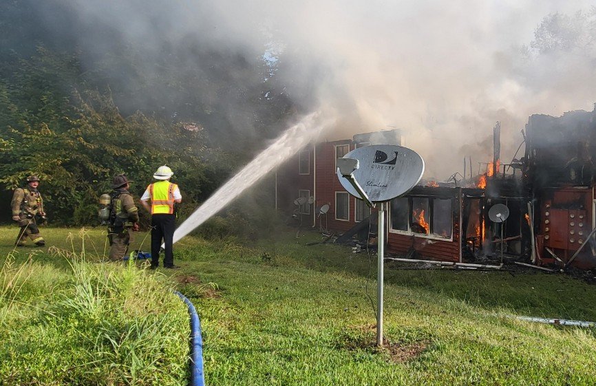 Lawrenceville Apartment Fire Displaces 31, Injures Firefighter After Roof Collapse