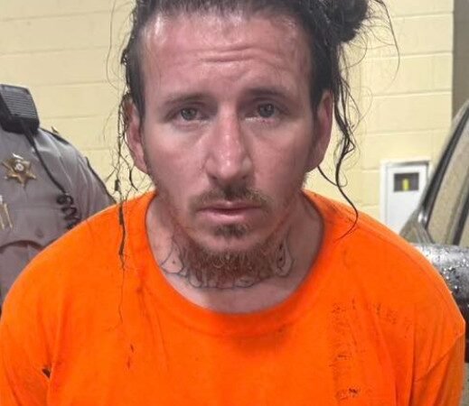 Deputy Wades Into Pond During Rainstorm to Capture Wanted Suspect in Bibb County