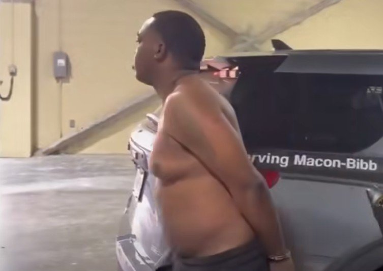 Armed Suspect with Violent Warrants Arrested at Macon Hotel, Faces Multiple Charges