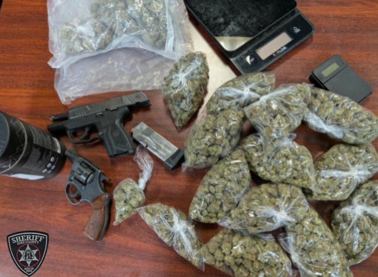 Convicted Felon Arrested After Guns Hidden in Ceiling, Marijuana Seized in Macon Raid