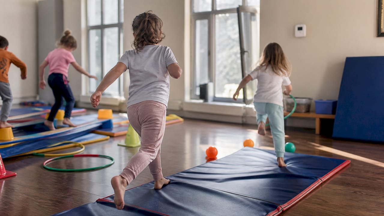 Children exercising indoors during alert