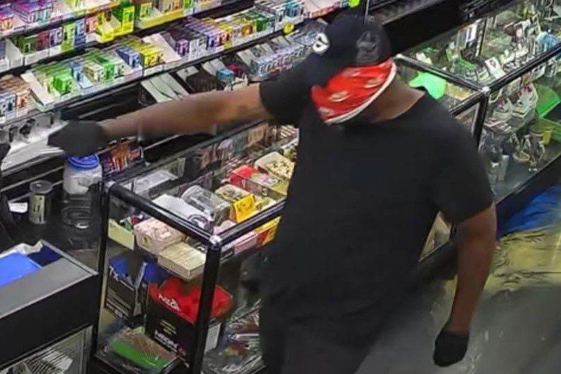 Two Armed Suspects Rob Macon Smoke Shop, Assault Clerk Before Fleeing on Foot
